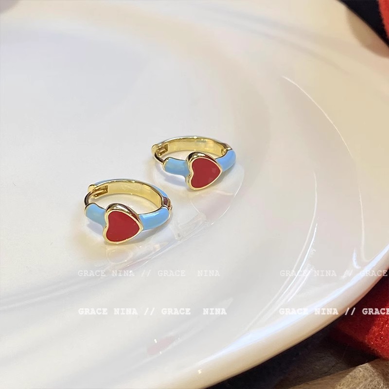 French red glazed heart-shaped stud earrings, a niche design for women, are fashionable and versatile. They exude a sense of sophistication and are personalized earrings for spring and summer Application Scenario