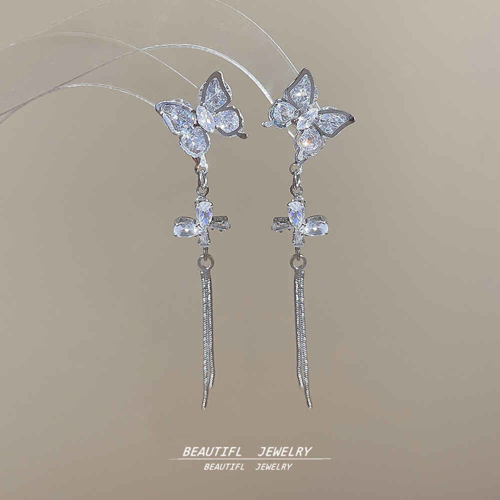 Exquisite zircon butterfly long earrings with a light luxury and high-end feel, 925 silver needle, niche and fashionable tassel earrings for women full figure