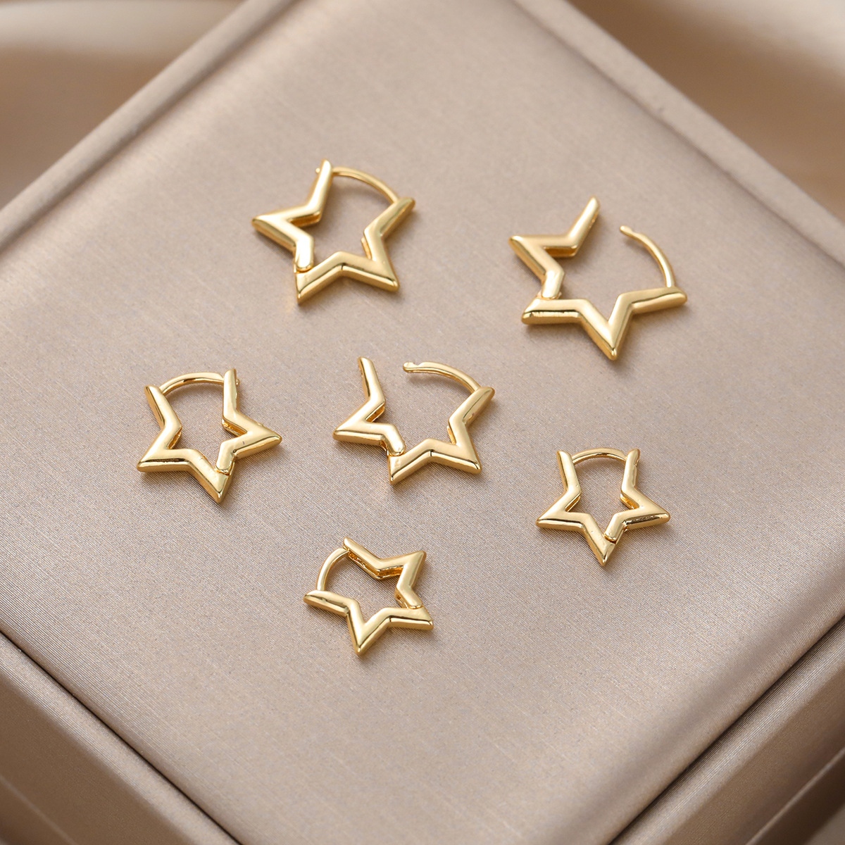 A set of 3-piece copper five-pointed star earrings in a minimalist and versatile style for cross-border fashion from Europe and America Application Scenario