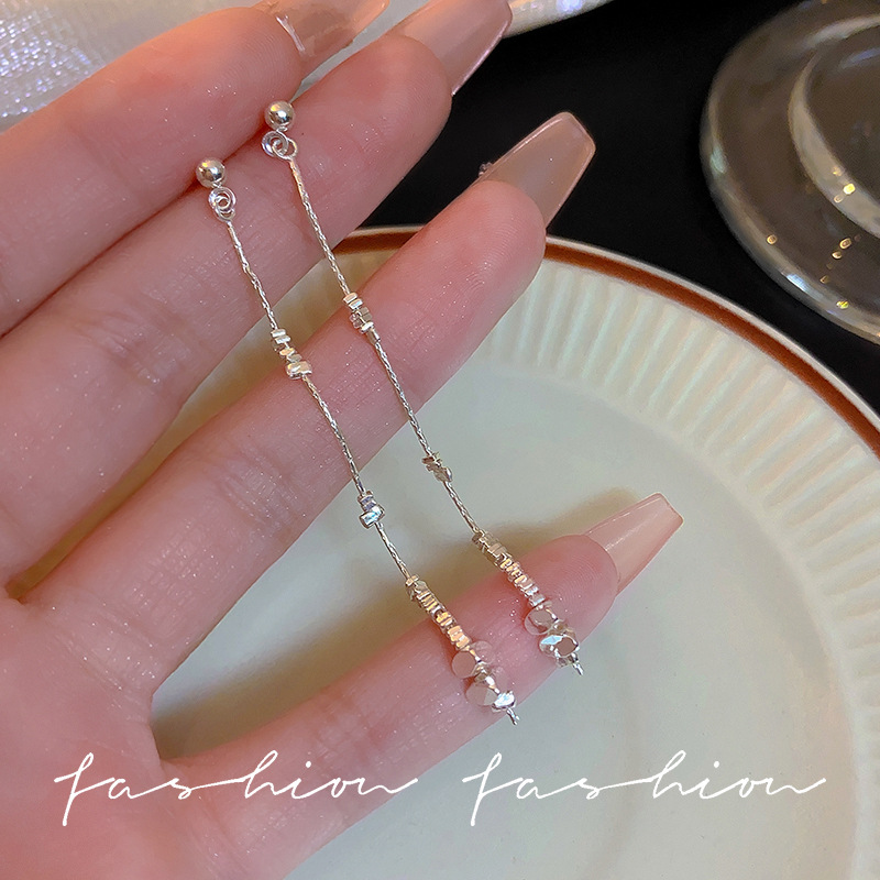 New Chinese-style silver pendant long tassel earrings, a niche design for women, exudes a sense of high-end, light luxury and grandeur. Silver needles Application Scenario