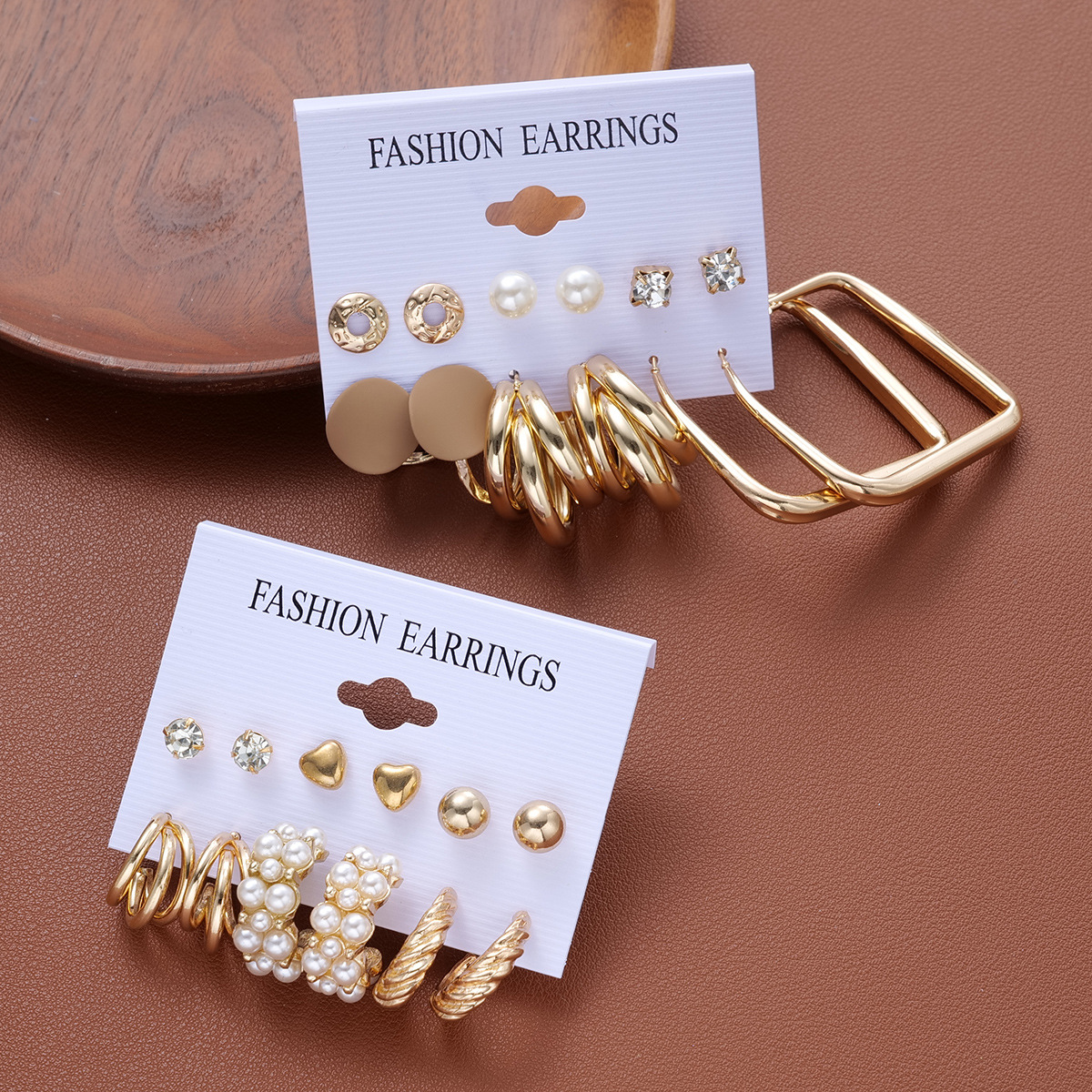 A new 12-piece set of square three-tube imitation pearl earrings from Europe and America, featuring creative and retro geometric-shaped ear loops Application Scenario