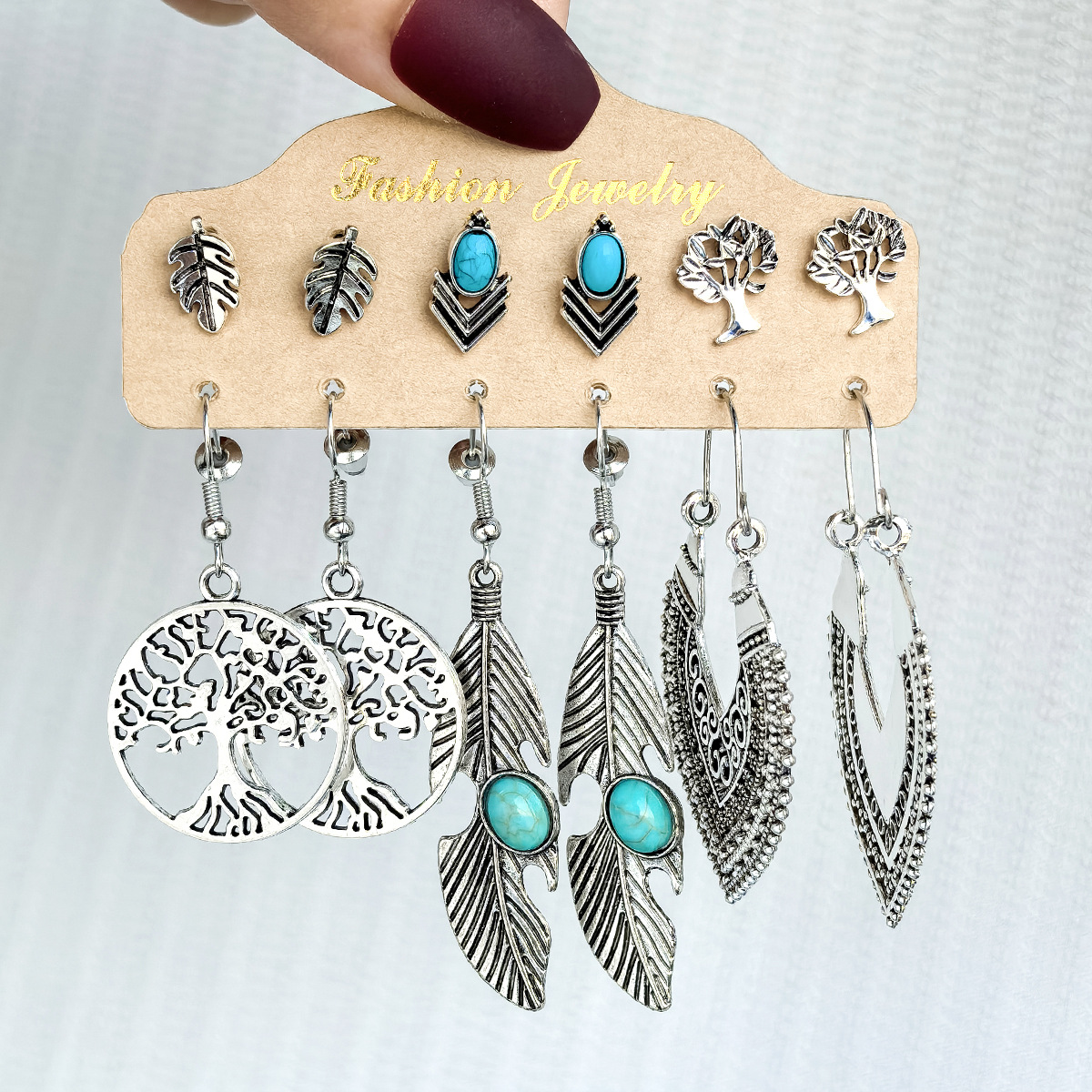 A set of 6-piece cross-border Bohemian-style turquoise carved earrings for women, featuring a retro and individualistic style full figure