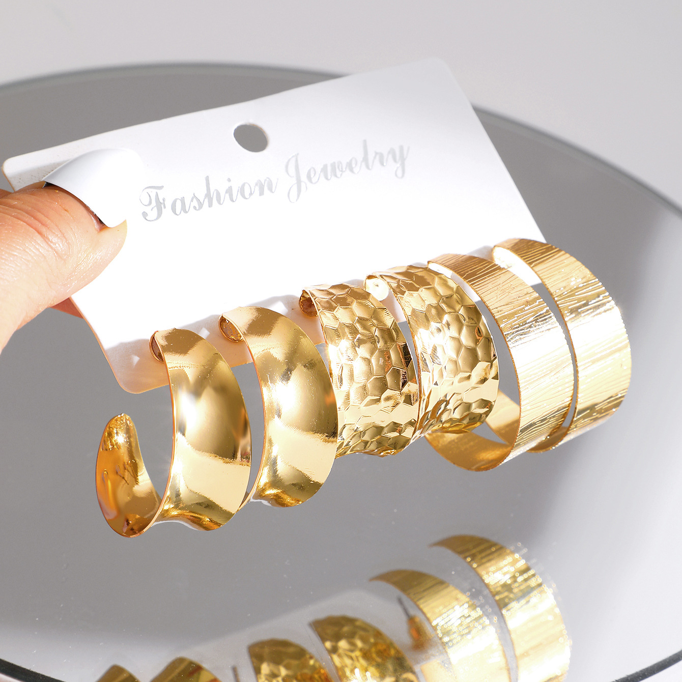 A new set of 3-piece creative retro C-shaped metal earrings with a unique and exaggerated gold personality from Europe and America details Picture