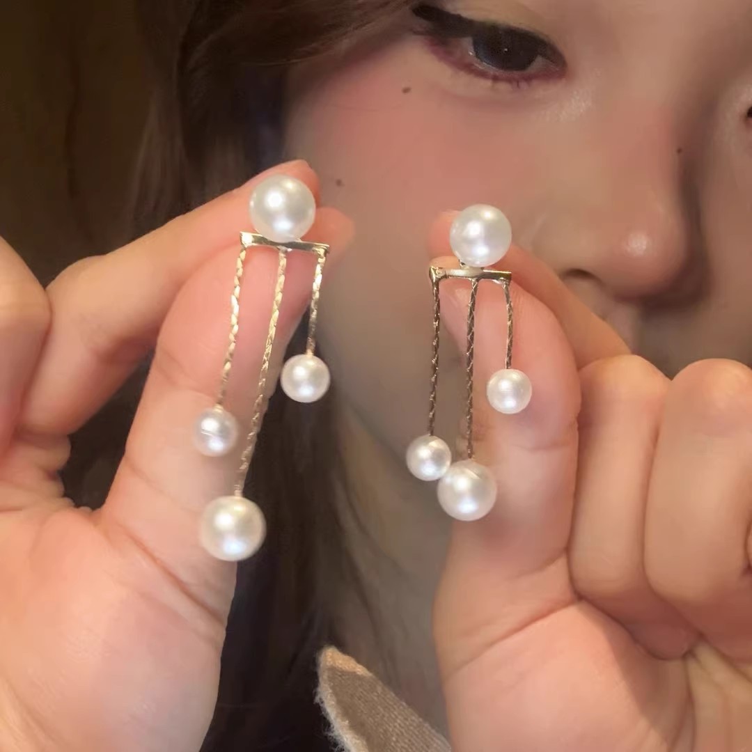 French high-end style long pearl tassel stud earrings, women's light luxury and fashionable style earrings, niche design, versatile earrings full figure