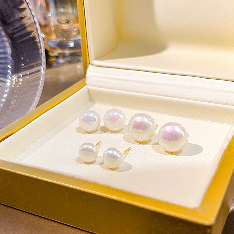Korean version simple, exquisite, small, round and colorful pearl stud earrings sweet, individual and elegant silver needle earrings wholesale for women full figure