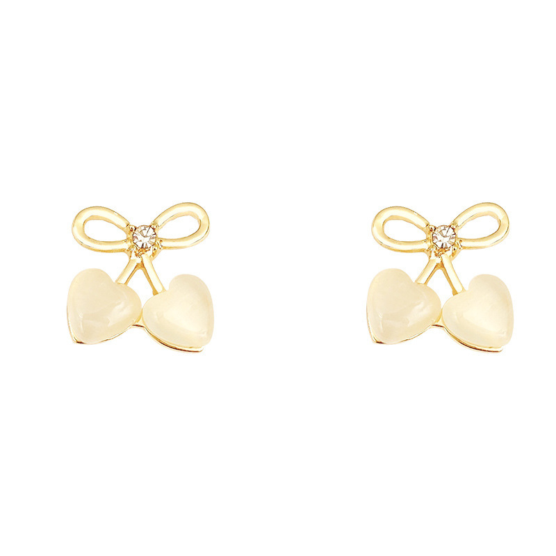 Korean simple bow, heart-shaped cat's eye stone stud earrings, feminine and niche design sense earrings, wholesale of internet-famous earrings Item Picture