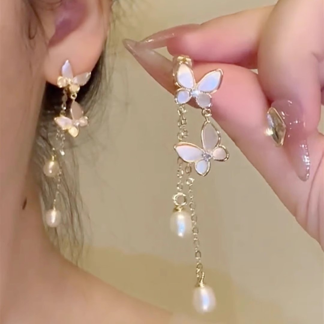 Pearl earrings, women's spring and summer butterfly long tassel earrings, niche high-end light luxury earrings, earrings, stud accessories full figure
