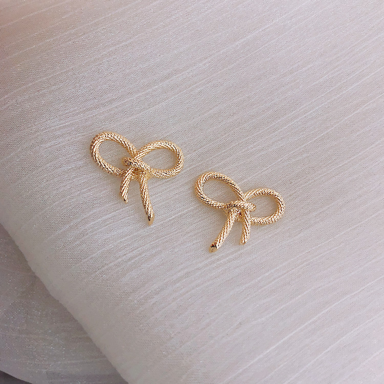 S925 Silver Needle Korean simple and compact bow earrings, metal commuter student style stud earrings Specification drawing