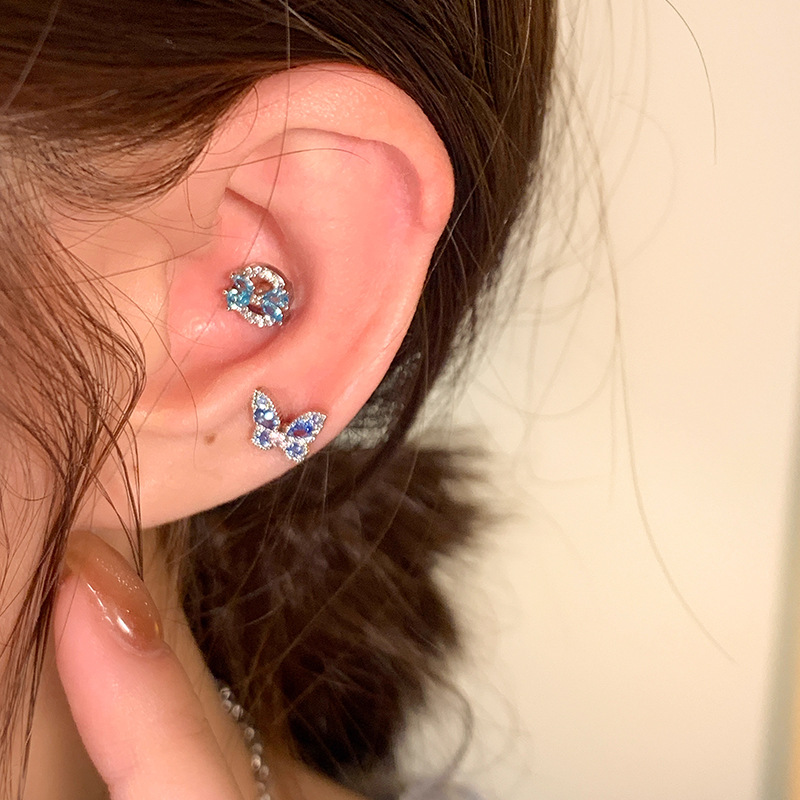 The trend of fresh and light blue butterfly star zircon full diamond ear studs, women's sparkling fine needle flat bottom ins style ear bone studs Application Scenario