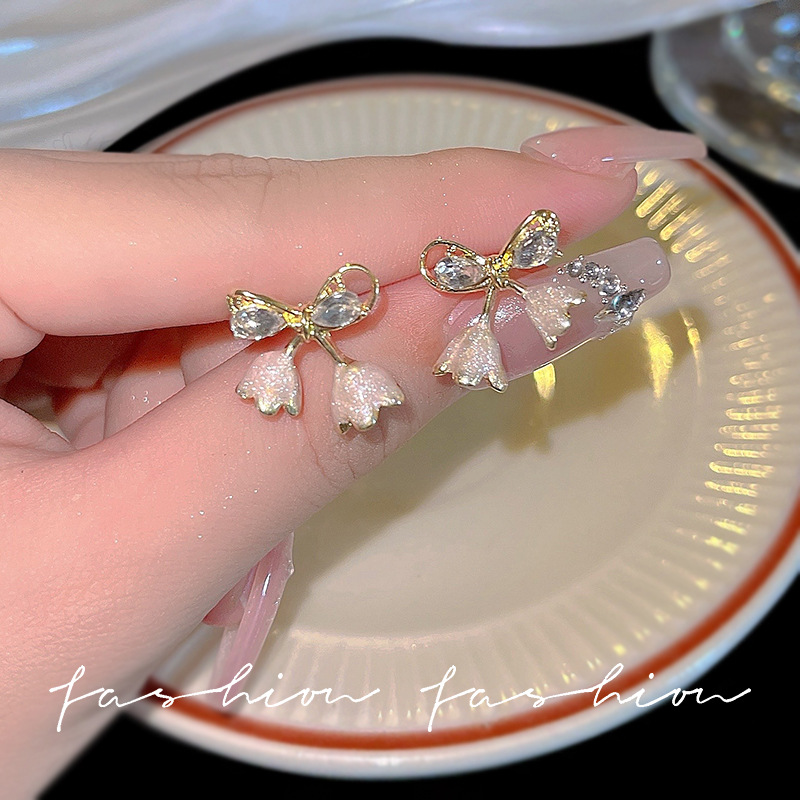 s925 Silver needle simple chanel-style bow stud earrings, elegant ins super fairy-like flower earrings, fashionable and individual earrings Specification drawing