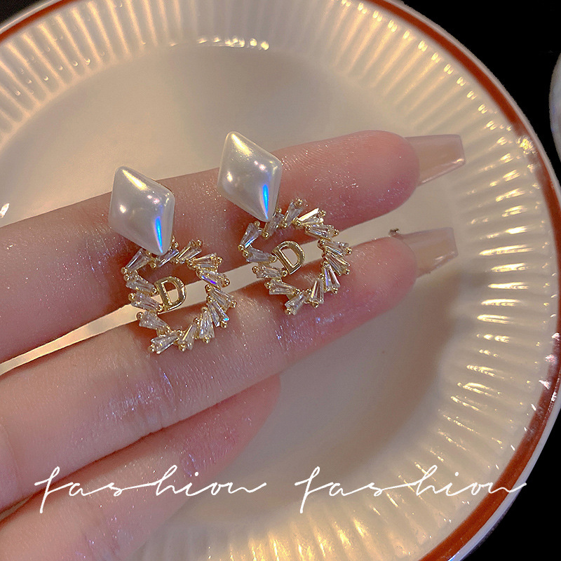 s925 Silver Needle, elegant, fashionable and exquisite letter pearl stud earrings, female Internet celebrity, super dazzling personality, niche design sense earrings full figure