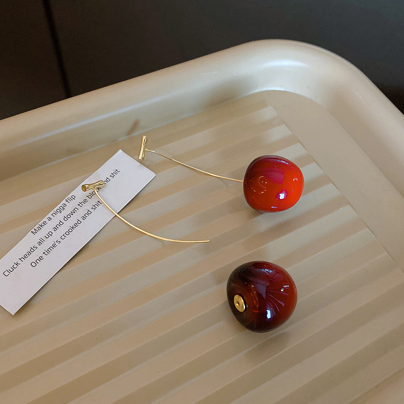 Korean Instagram pastoral windmill cherry earrings, a unique long pair of earrings, are fashionable and elegant earrings that are popular on the Internet full figure