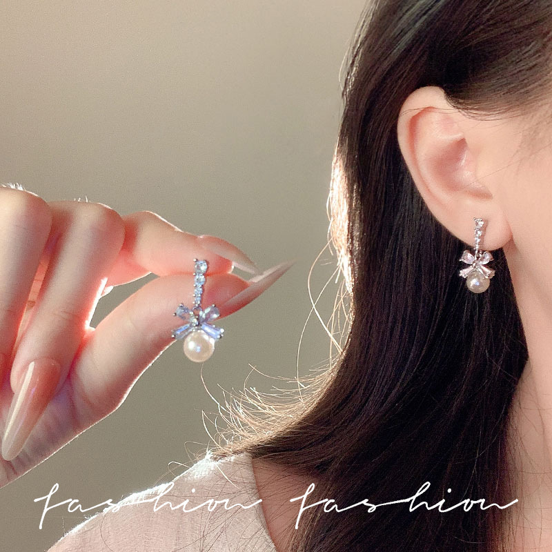 Super Flash Zircon Bow Pearl Earrings 2025 New bestseller Stud earrings, niche design sense, high-end earrings for women details Picture