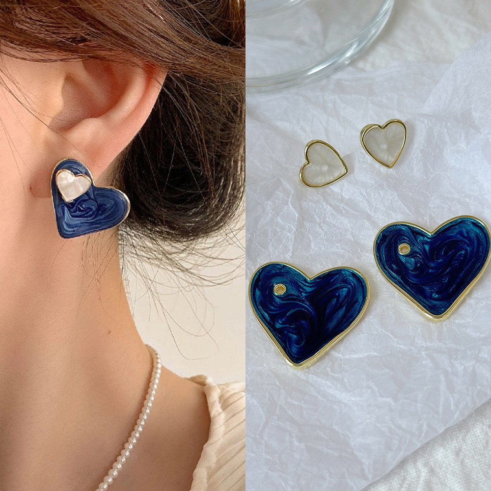 Fashionable blue oil-dripping irregular heart-shaped earrings, niche design sense, heart-shaped stud earrings, elegant and high-end earrings for women full figure