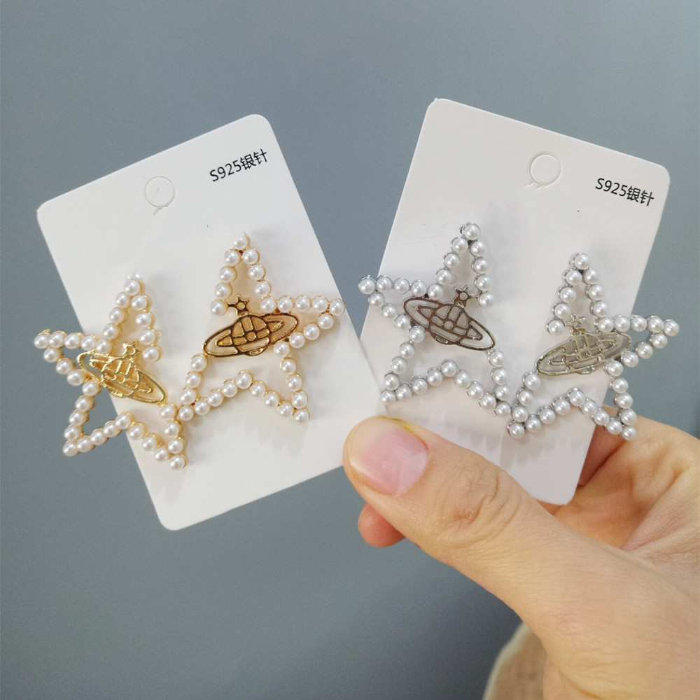 Korean S925 sterling silver needle exaggerated star stud earrings, elegant pearl five-pointed star earrings, versatile and super fairy earrings full figure