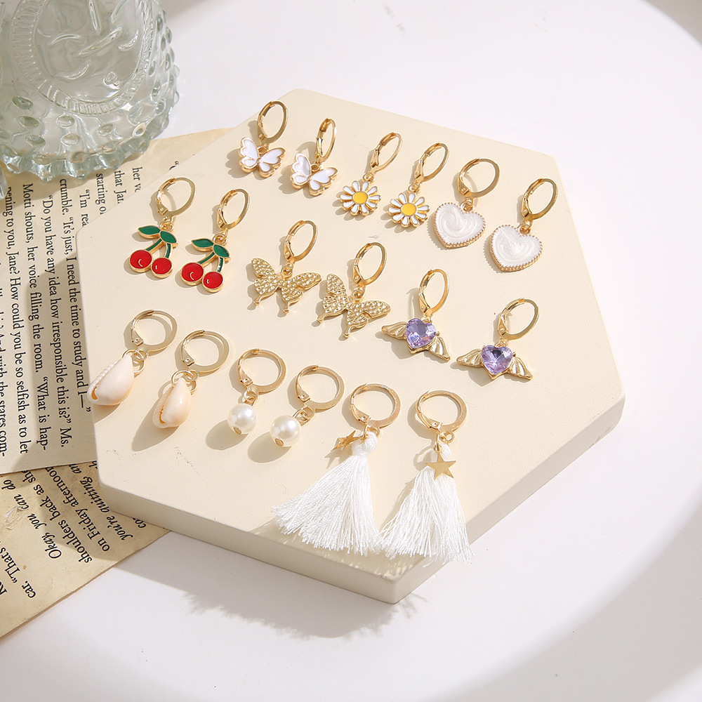 Wholesale of 9 pairs of creative butterfly heart cherry imitation pearl ear buckles in the new cross-border alloy rhinestone earring set Application Scenario
