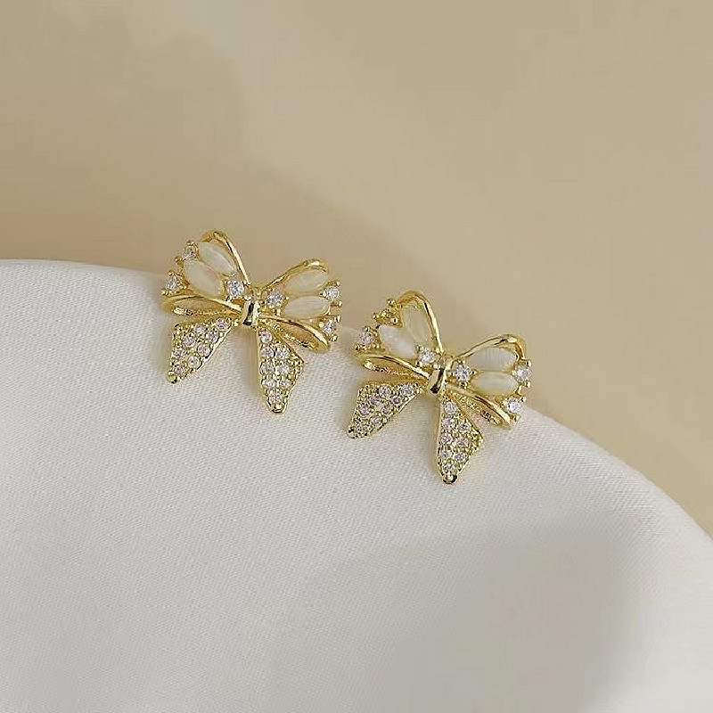 S925 Silver needle Full diamond bow stud earrings, Korean design sense cat's eye stone earrings, elegant and light luxury earrings details Picture