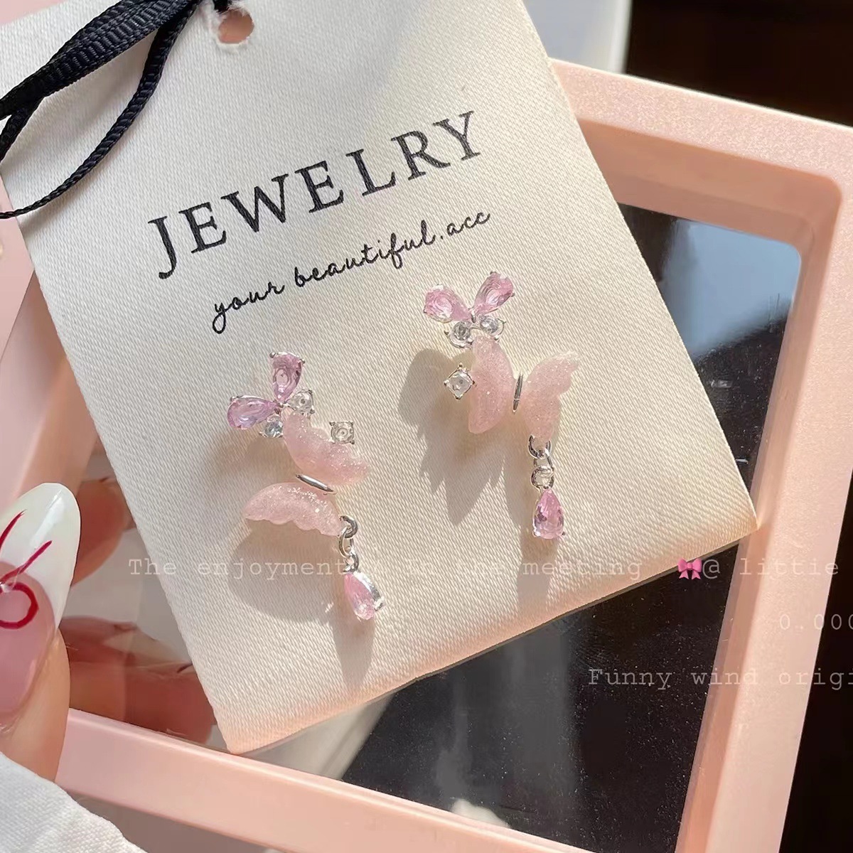 Pink girlish butterfly tassel stud earrings, sweet Korean style, high-end, fashionable and elegant earrings, niche earrings and pendants Application Scenario