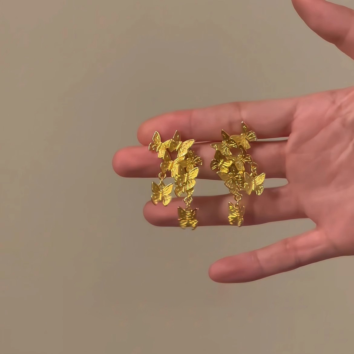 "Group of Butterflies Dancing: Retro Golden Butterfly Earrings 2025 New bestseller, high-end, light luxury, niche and unique earrings for women. details Picture