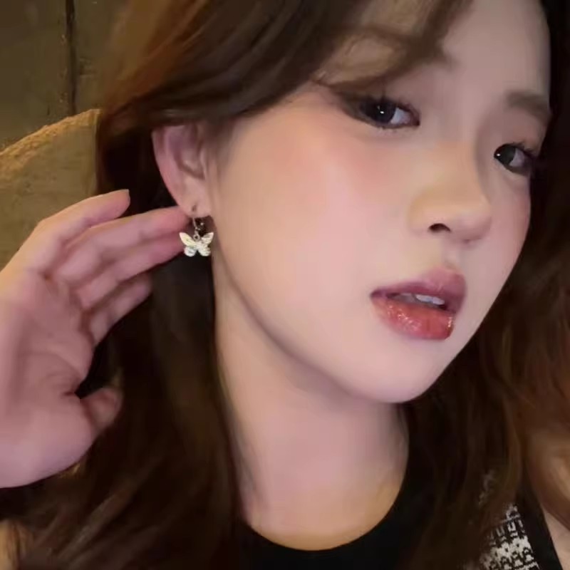 Retro silver butterfly earrings for women, 2025 new bestsellers, light luxury and high-end, unique and elegant ring earrings details Picture
