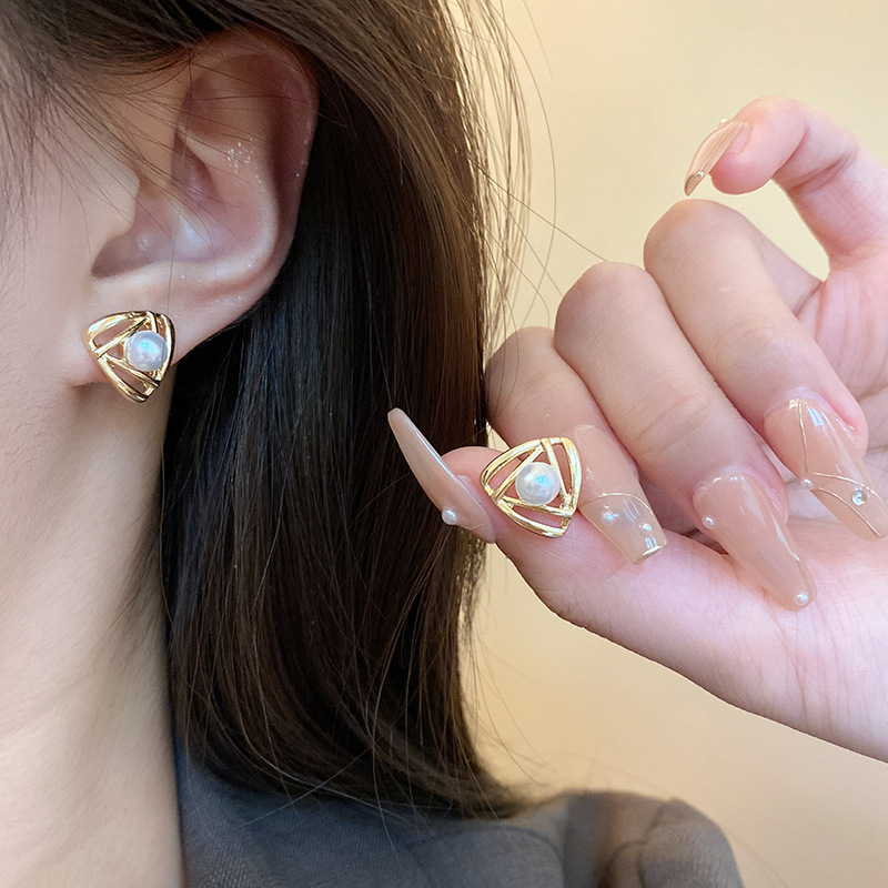 S925 Silver Needle New Korean ins style elegant pearl hollowed-out triangular geometric small and simple stud earrings full figure