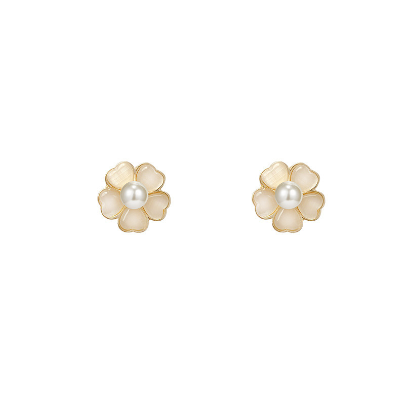 S925 Silver Needle Korean version New Summer cat's eye stone small flower ear studs simple, elegant and fashionable earrings for women Item Picture