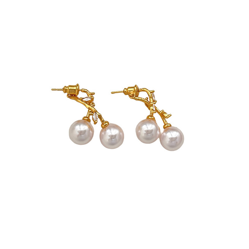 Golden zircon cross-leaf pearl stud earrings, a unique two-pair earring design for women, with a niche and elegant style. Silver needle earrings Item Picture