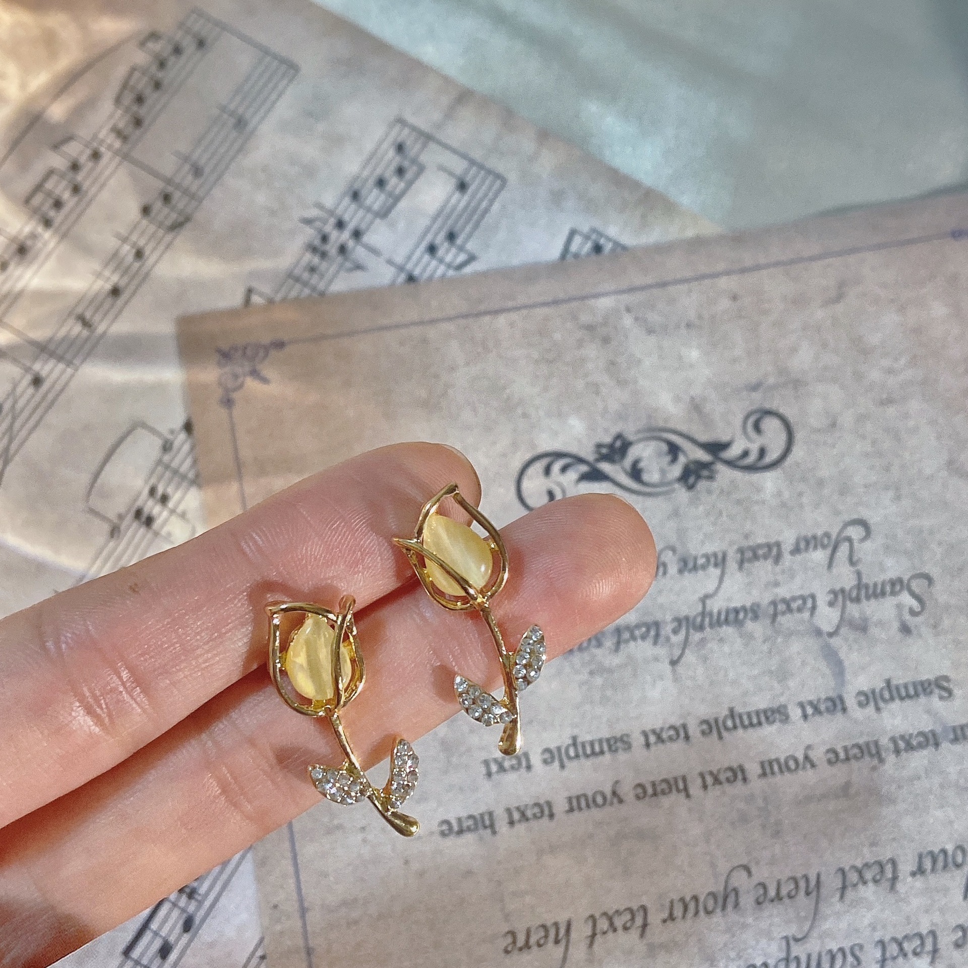 S925 Korean elegant silver needle tulip flower stud earrings, internet-famous elegant and stylish cat's eye stone earrings for women full figure