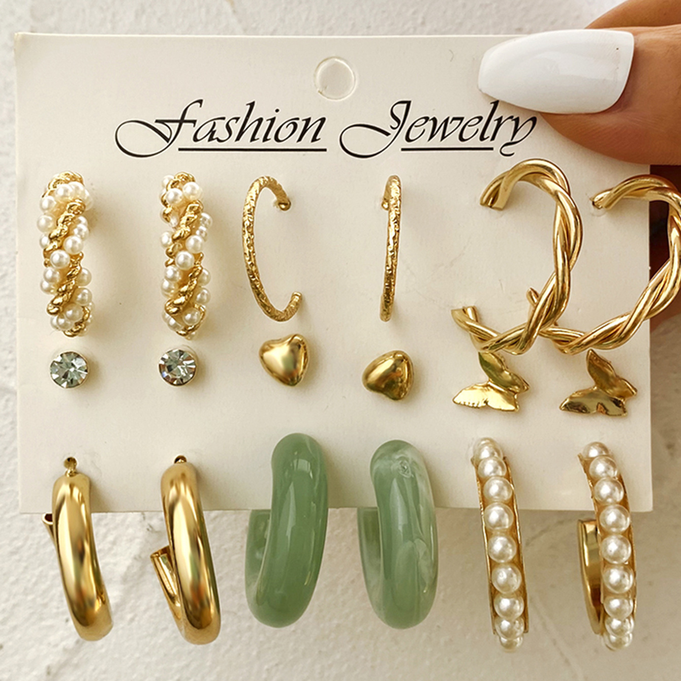Wholesale of popular C-shaped earrings from Europe and America, creative retro imitation pearl circle earrings set of nine pieces details Picture