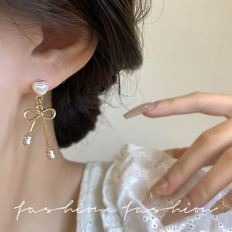 s925 silver needle elegant pearl earrings, sweet bow for women, internet-famous stud earrings, light luxury style, versatile ear pendant accessories Application Scenario