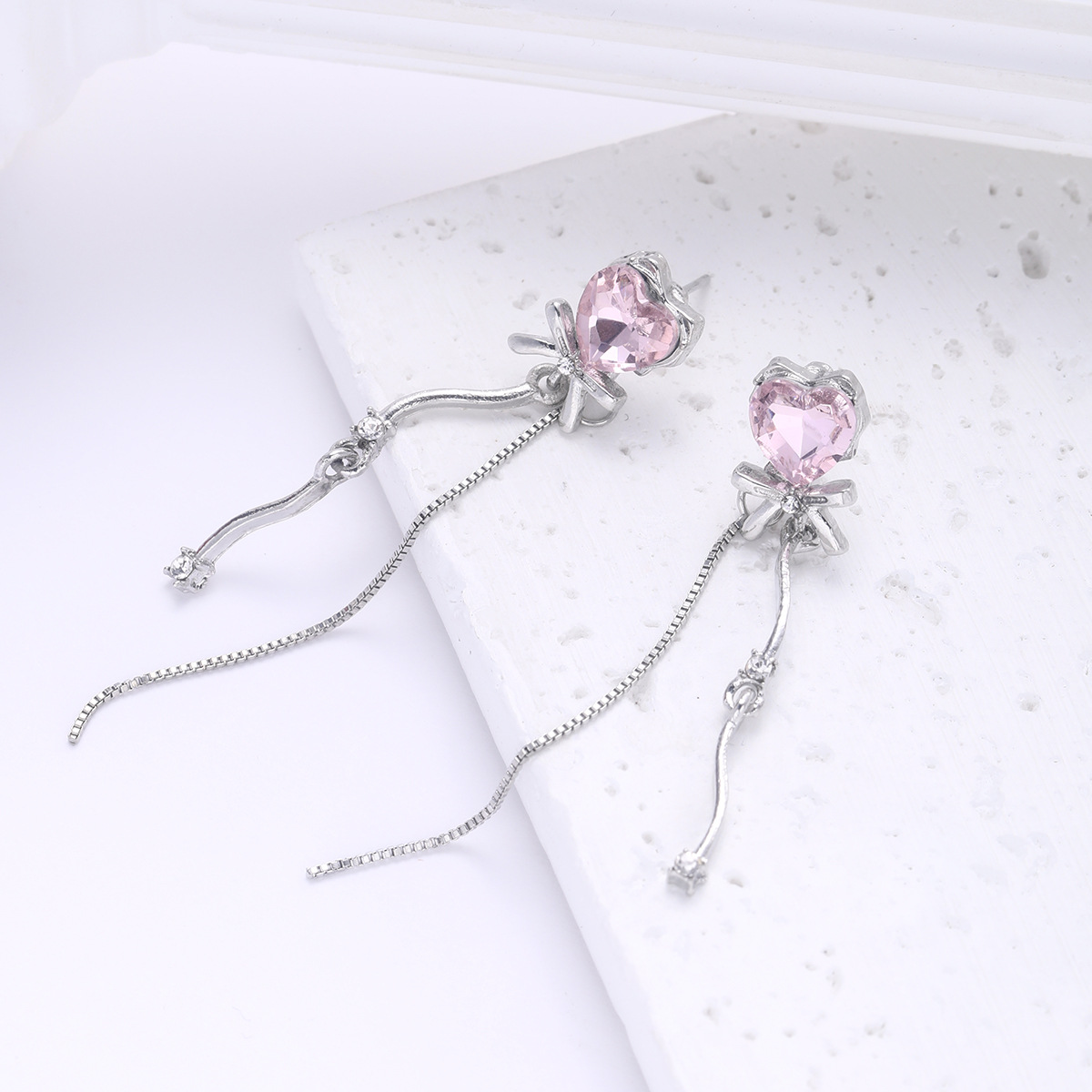 New cross-border, simple and high-end creative bow, heart-shaped, niche and light luxury tassel earrings, ladies' elegant earrings Application Scenario