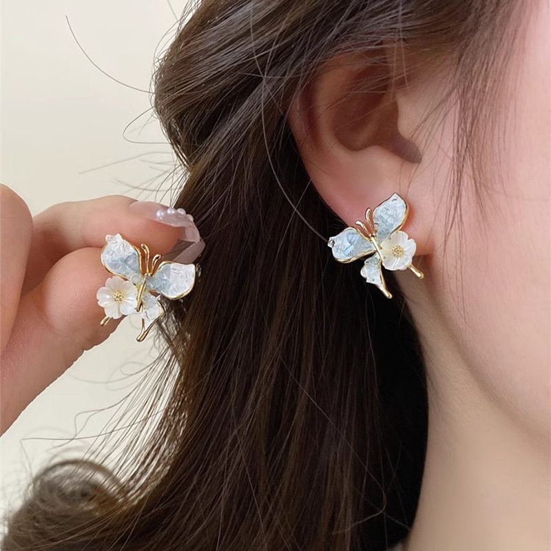 Korean-style gradient blue butterfly flower stud earrings, fresh and unique, versatile earrings, high-end and exquisite silver needle earrings full figure