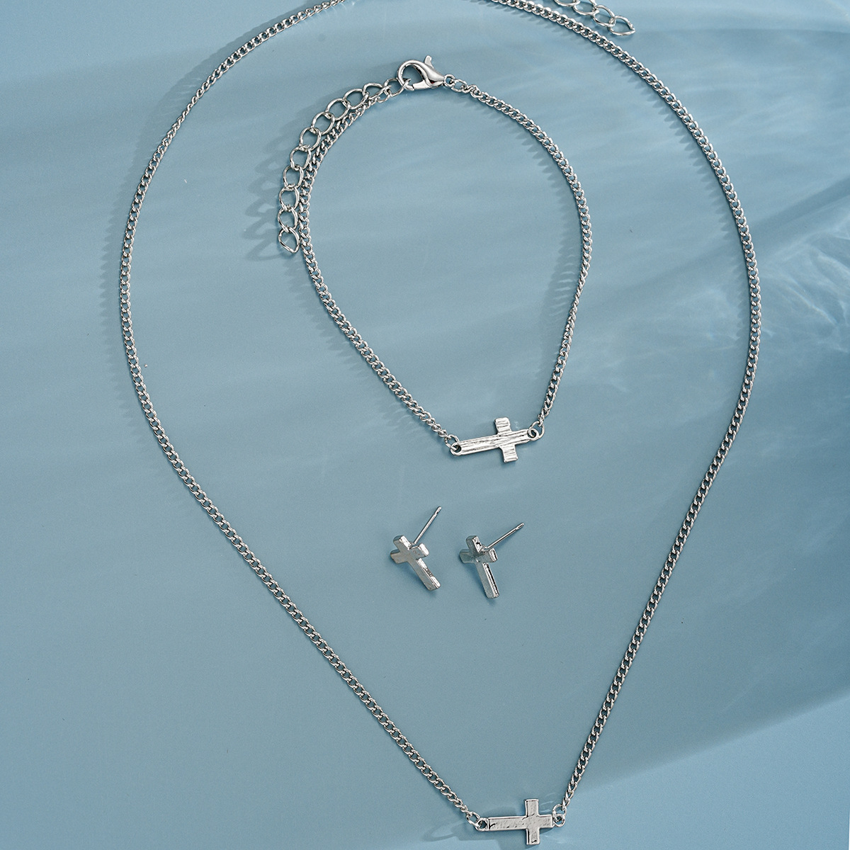 Cross-border European and American fashion, simple and niche design cross stud bracelet necklace set, high-end design sense set Item Picture