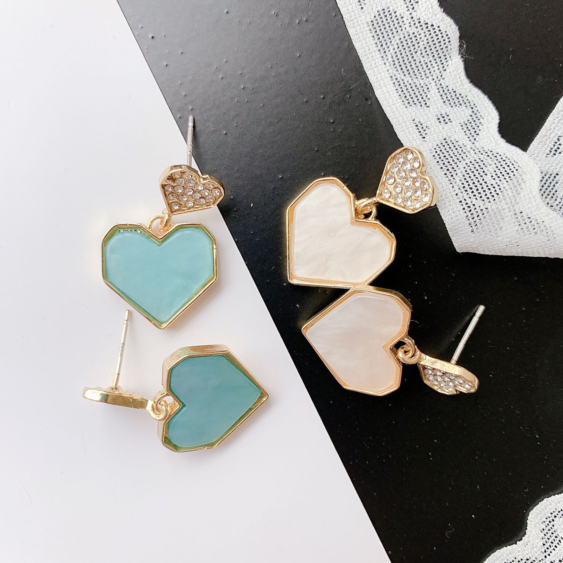 S925 Silver needle simple geometric heart-shaped earrings, internet-famous style, versatile earrings, micro-set sparkling diamonds, super fairy earrings wholesale Application Scenario