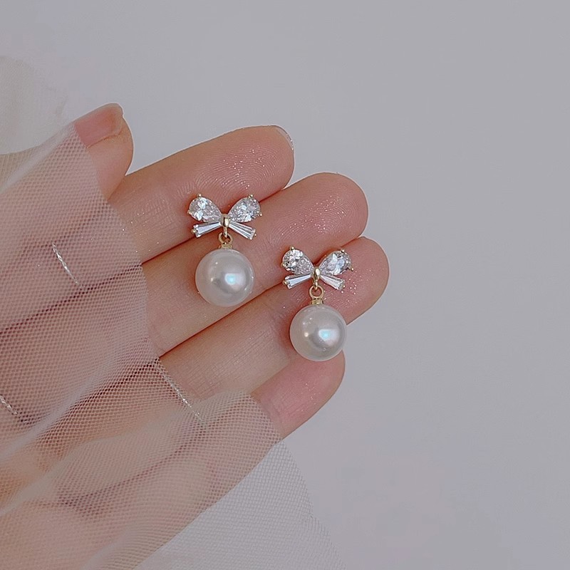 Sweet and elegant bow pearl earrings, women's fashion and high-end sense, light luxury zircon earrings, delicate and gentle small stud earrings Specification drawing
