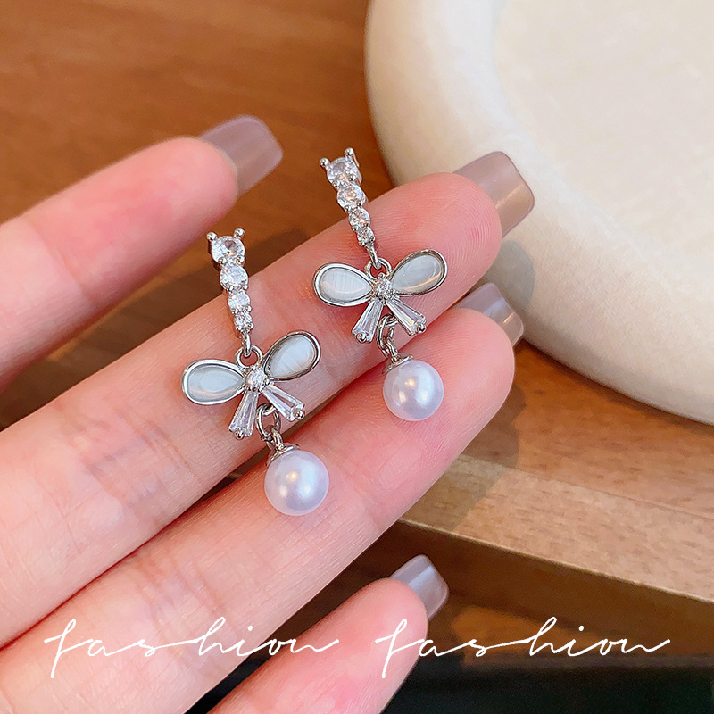 Super fairy-like bow pearl long tassel earrings with unique charm, niche stud design sense, high-end earrings for women full figure