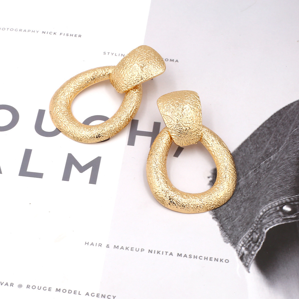 European and American simple golden teardrop-shaped earrings, new alloy street style earrings and earrings, cross-border accessories manufacturer in stock Specification drawing