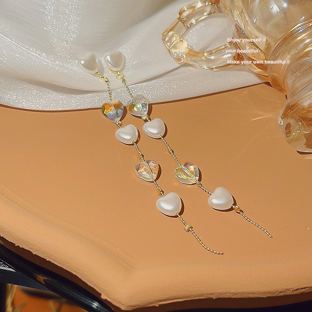 Long tassel crystal pearl heart-shaped earrings exude a sense of high-end luxury and a ladylike charm. These small and exquisite earrings can enhance your face Specification drawing