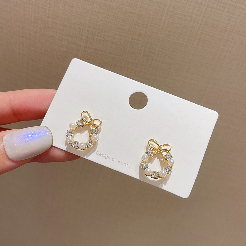 Korean Internet celebrity style, small bow stud earrings, female design sense, diamond-encrusted circle earrings S925 silver needle earrings Specification drawing