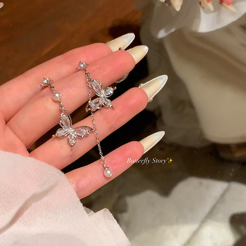 Butterfly Zircon tassel pearl earrings for women 2024 New bestsellers Asymmetrical earrings with a light luxury and high-end feel, a trend of stud earrings full figure