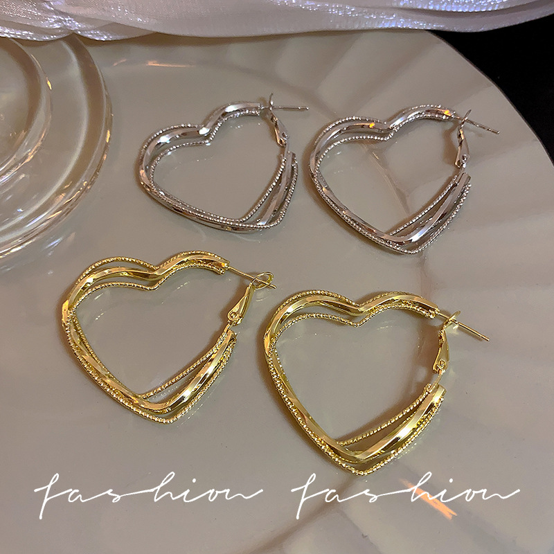 Silver exaggerated heart-shaped earring earrings for women, European and American cross-border plain ring earrings, with a niche design sense, suitable for round faces. Silver needle earrings details Picture