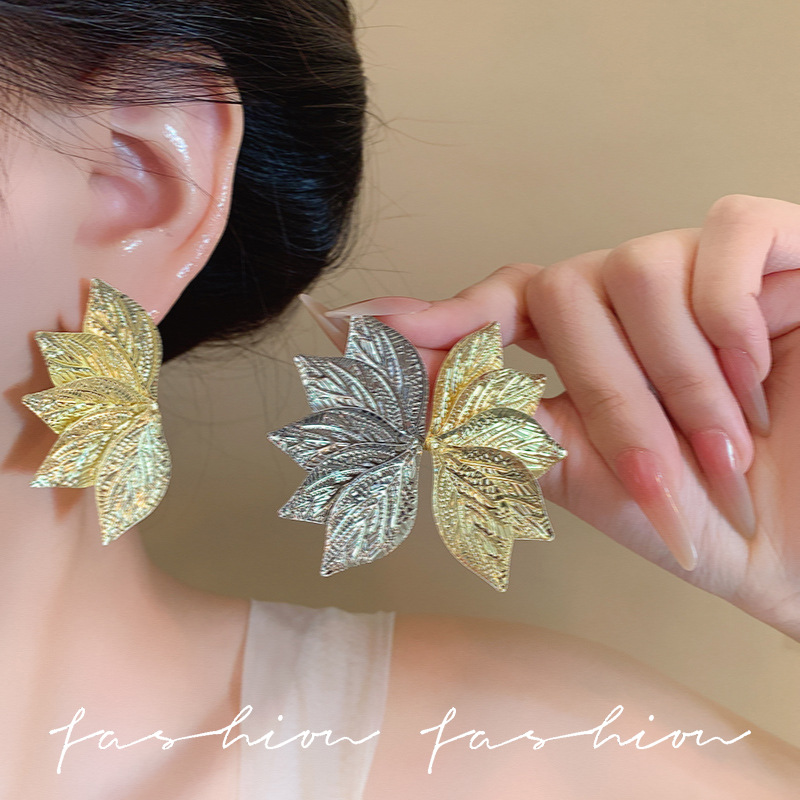 Gold and silver dual-color leaf-shaped textured earrings, symmetrical cross-border earrings, five-leaf multi-layered accessories full figure