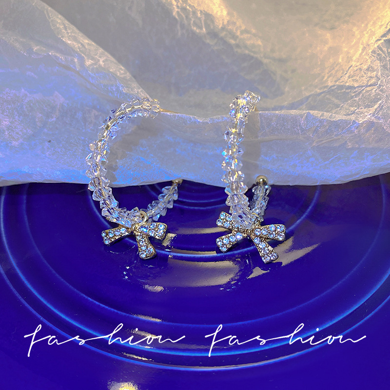 The new 2023 Super fairy bow zircon stud earrings feature a simple and niche design with a high-end crystal beaded look for women Application Scenario