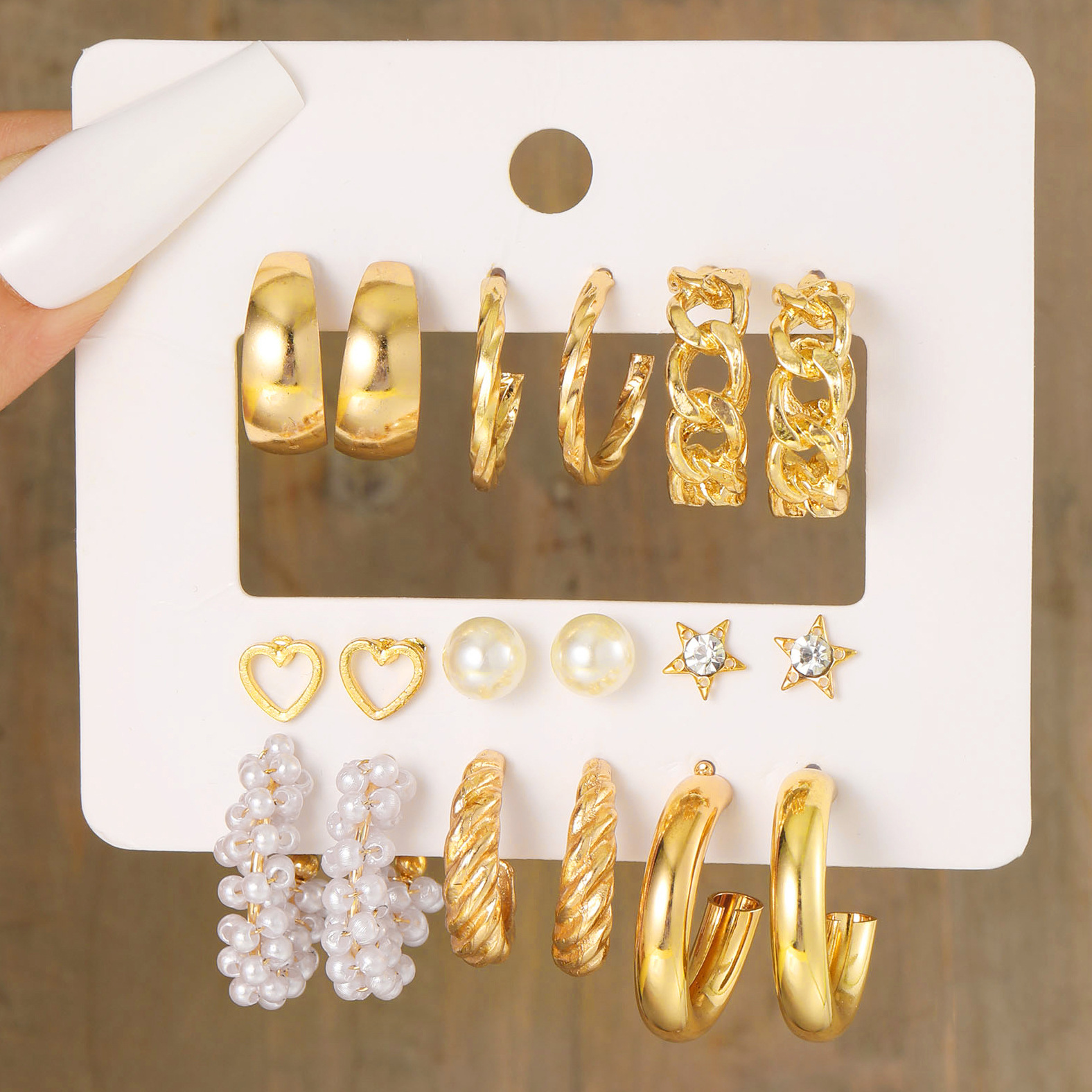 A new cross-border metal twist earring set of 9 pieces, featuring multiple pairs of creative and simple ear rings and geometric earrings full figure