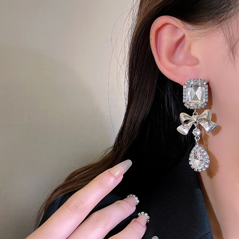 925 Silver needle diamond geometric bow teardrop earrings, European and American exaggerated design sense earrings, elegant and light luxury earrings details Picture
