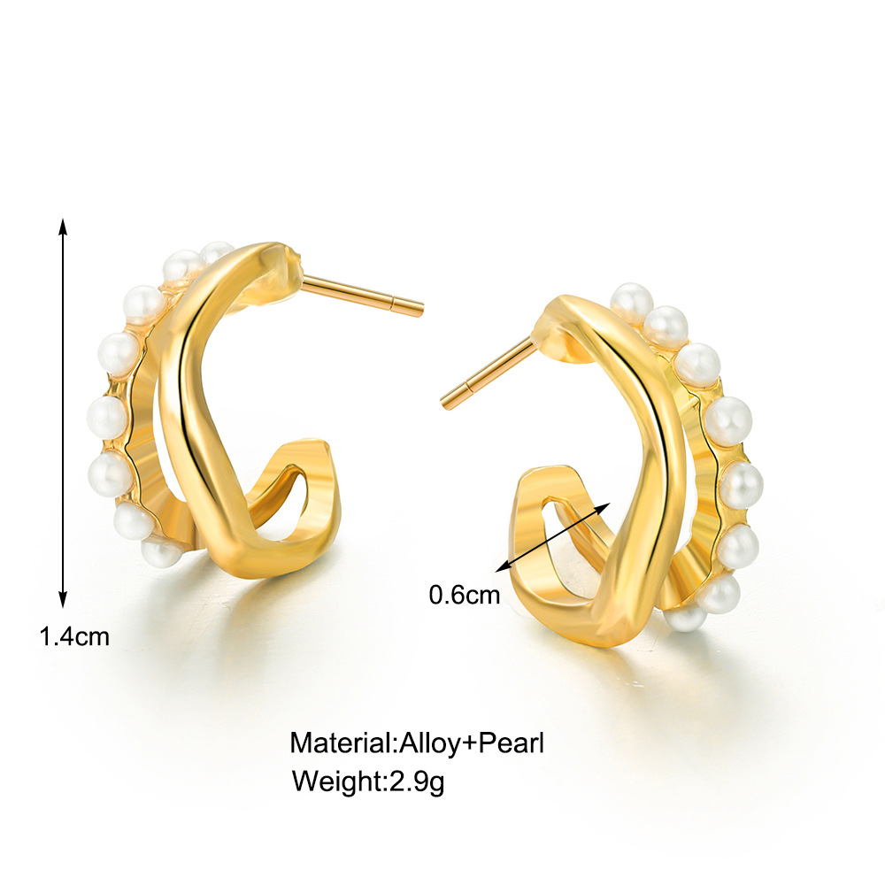 European and American best-selling, niche design, retro imitation pearl earrings, creative and unique metal stud earrings, light luxury autumn and winter earrings details Picture
