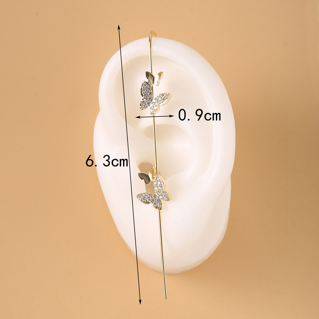 European and American cross-border embedded water diamond ear hooks, piercing ear needles, women's design, butterfly-shaped oblique line ear studs around the auricle, unique details Picture