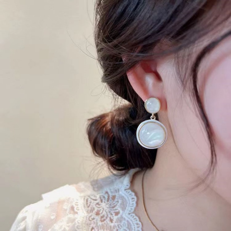 S925 Silver Needle New Style trendy and gentle cat's eye stone earrings, feminine light luxury stud earrings, elegant internet-famous earrings details Picture