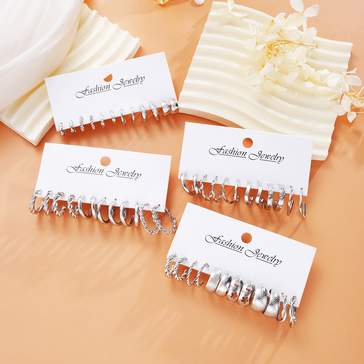 Wholesale of 24-piece set of new cross-border fashionable C-shaped alloy earrings from Europe and America, simple and ins personalized earrings and accessories Application Scenario