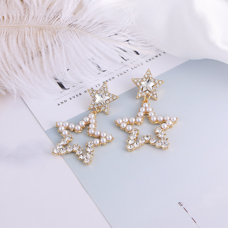 Star water diamond earrings, women's pearl silver needle earrings, five-pointed star hollowed-out geometric pearl diamond spring stud earrings Application Scenario